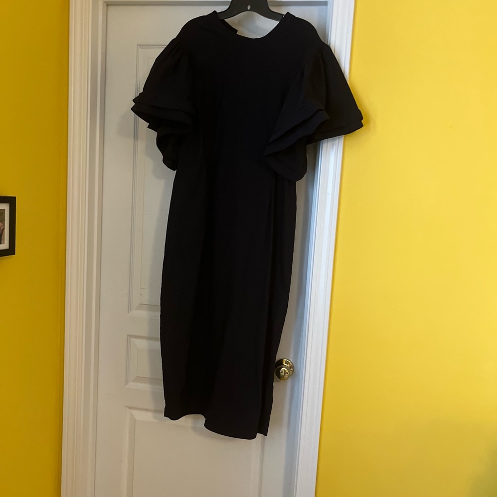 Blue bodycon with larger ruffle sleeves
